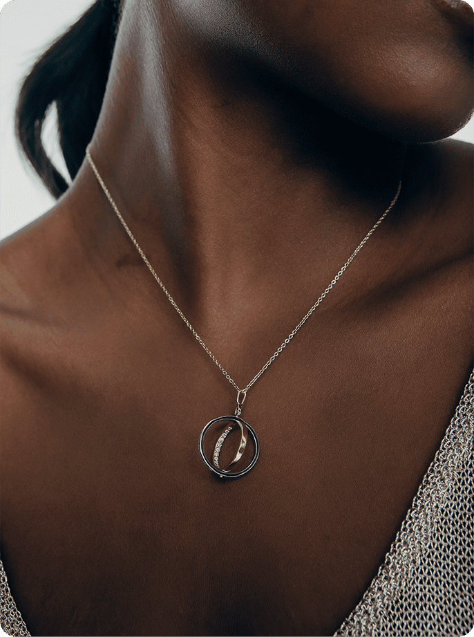 Dije Pangu Oro Blanco y Oro Amarillo 18K